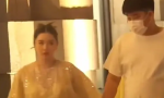 阚清子穿纱裙和老公牵手散步 孕肚明显气色不错