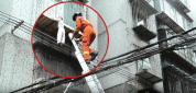 一小孩头卡3楼防盗窗悬空 消防员10分钟将人救下