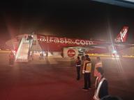 亚航一航班起飞前多次报警致延误 货舱烟雾误报引发关注