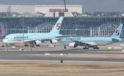 韩国一载230人客机起飞前发现实弹 大量警方进行现场搜查