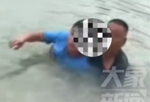 男子来不及脱衣跳河救人 湿透全身不留名悄然离去