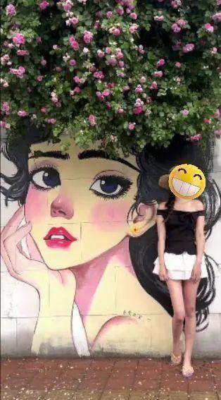 “薔薇女孩”墻繪因影響交通被涂白