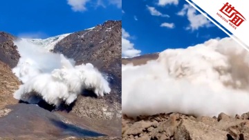 国际丨游客近距离拍摄吉尔吉斯斯坦冰川崩落瞬间