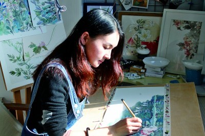 　　青年插画师刘江萍在绘图。受访者供图
