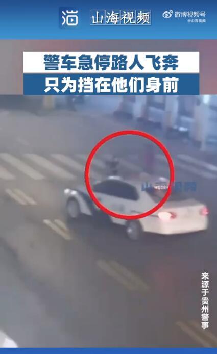 幼童横穿马路被热心女子立即上前护住