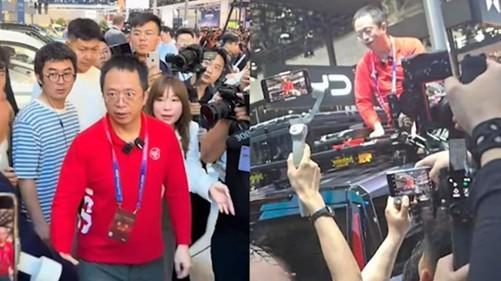 周鸿祎成北京车展“最火车模” 爬车顶引爆话题