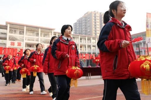 西安庆安初级中学中学领导集体为中考生“点燃心灯 开启智慧”