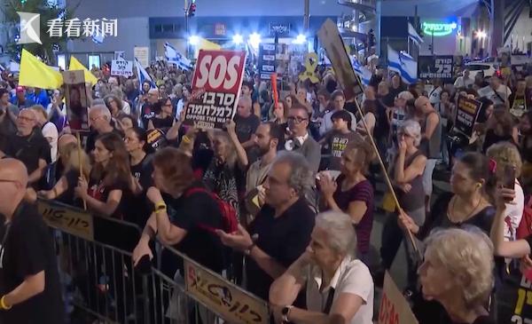 加沙一女子受访时身后落下炸弹!