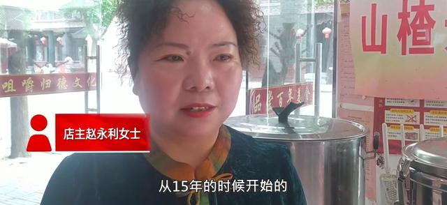 大妈坚持为游客提供热水，已坚持8年每天能提供1000多杯