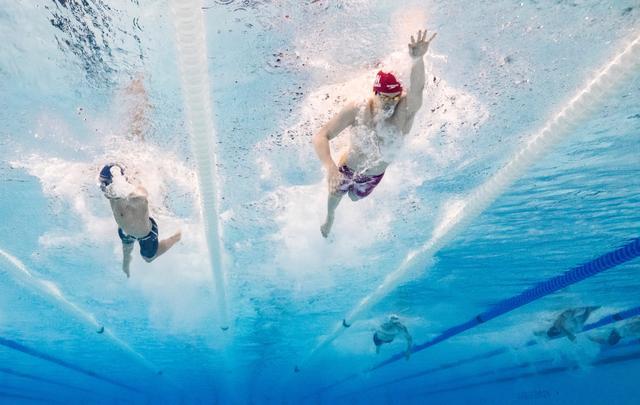中国游泳健儿用实力赢得尊重 打破美国40年垄断夺冠