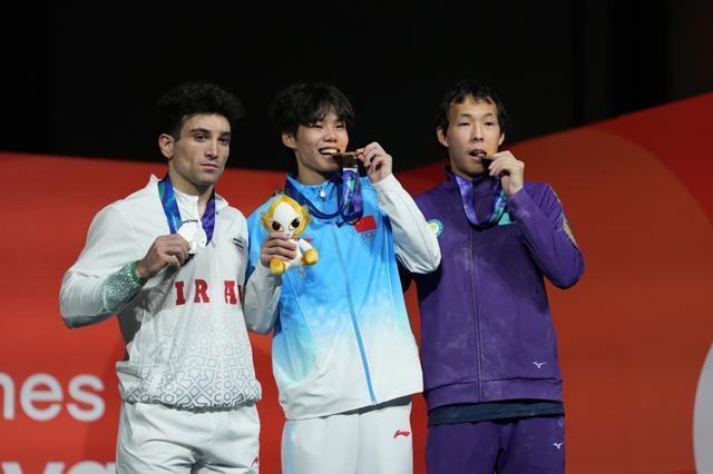 亚运赛场的体育热血彰显家国情怀 国庆献礼夺四金