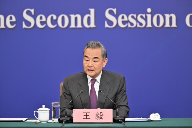 Wang Yi: China will be a force for peace, stability, progress