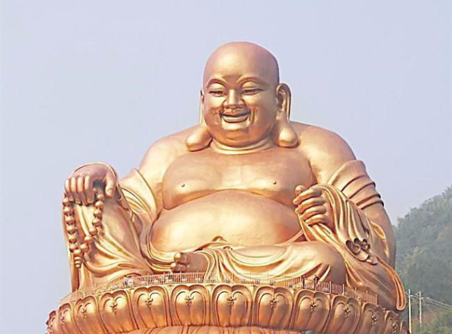 佛寺内迎客而笑的大肚和尚是谁？