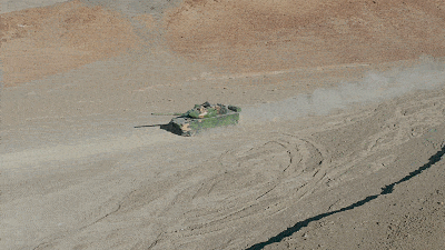 The 15 light tank of Xinjiang Military Region first changed to digital camouflage and perfectly integrated with plateau and mountain