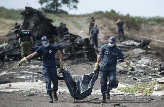 当地时间2014年8月2日，顿涅茨克地区格拉博沃，马来西亚航空公司MH17航班坠毁现场。图片来源：视觉中国