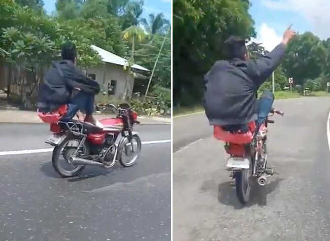 疯狂！菲律宾男子蹲坐后座不扶方向骑摩托车