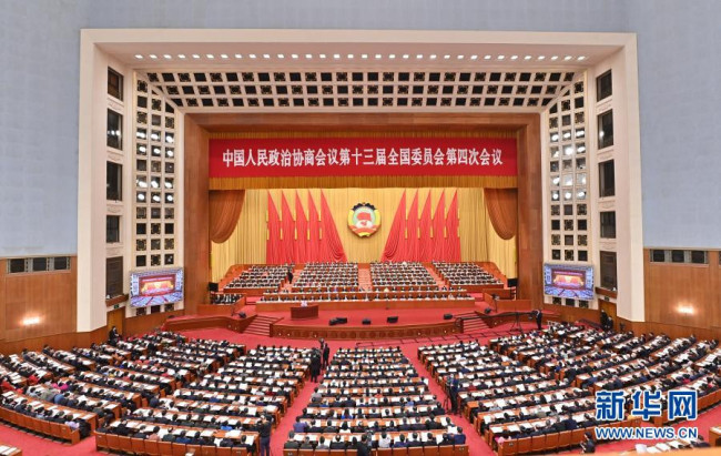 3月7日，全国政协十三届四次会议在北京人民大会堂举行第二次全体会议。新华社记者 李鑫 摄