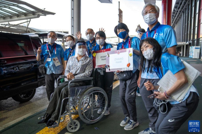 东京残奥会中国体育代表团第三批团队抵达东京。