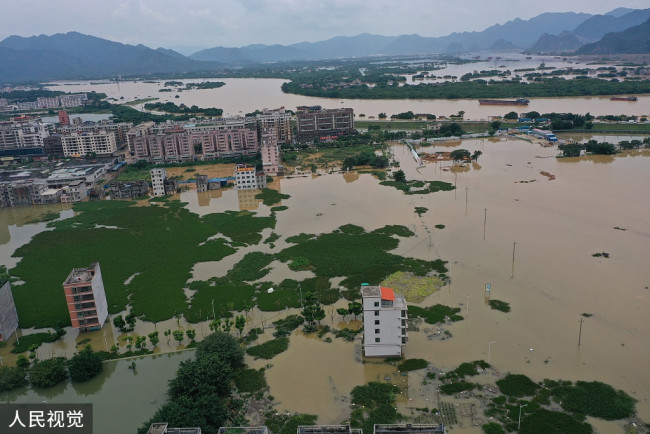 2022年6月22日，北江洪峰过境，广东省清远市英德市大站镇，房屋被水淹没。