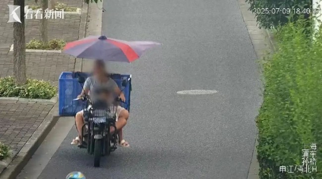 危险行为大赏：女子骑车带娃不戴头盔闯红灯上高速