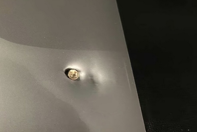 中国商人巴西遭抢劫 电脑挡下一枪