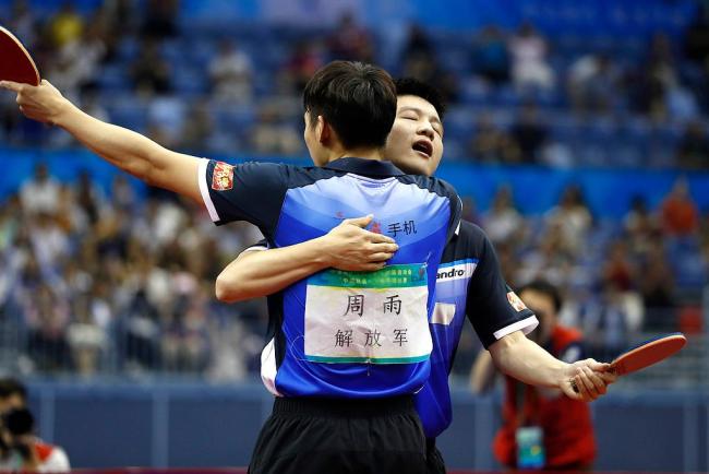 樊振东取得开门红晋级男单16强 老友对决完胜周雨