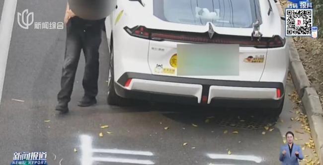 男子模仿施工人员私划停车位被罚 自制车位惹祸