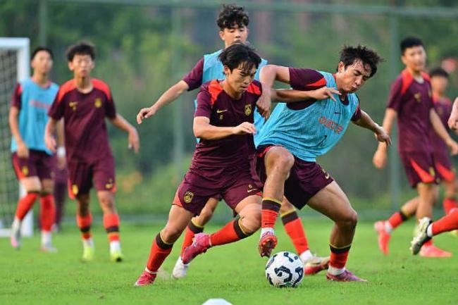 中国为何连办两届U20男足亚洲杯 助力中国足球发展