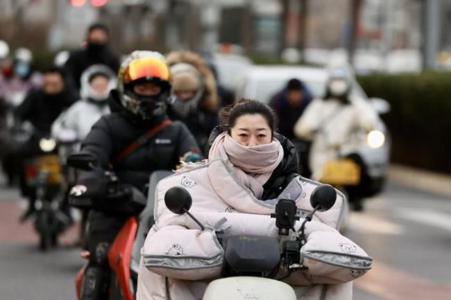 北京大风寒潮双蓝色预警持续生效