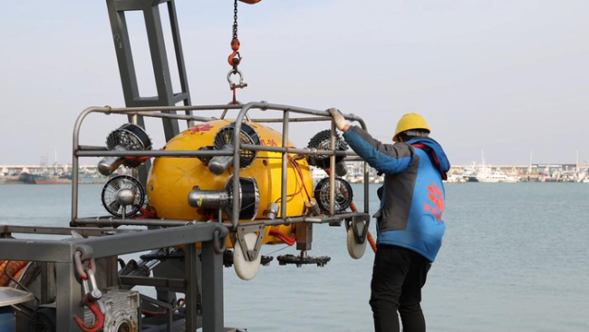 中国“洗船”机器人挺进马六甲海峡 智能装备助力航运