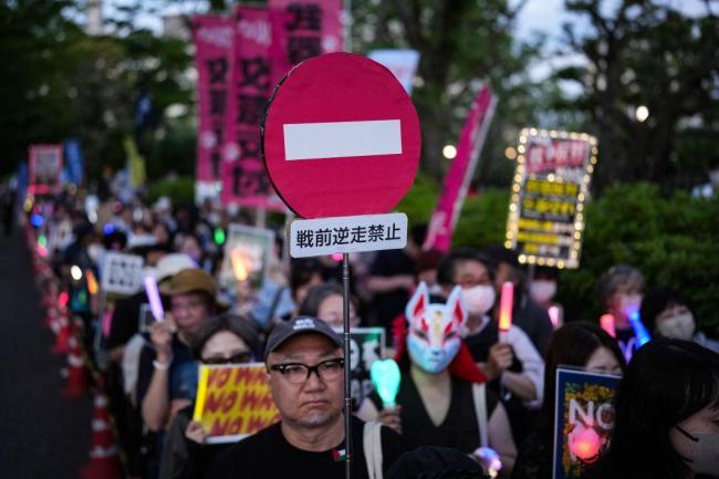 媒体：日本军国主义休想“借尸还魂”